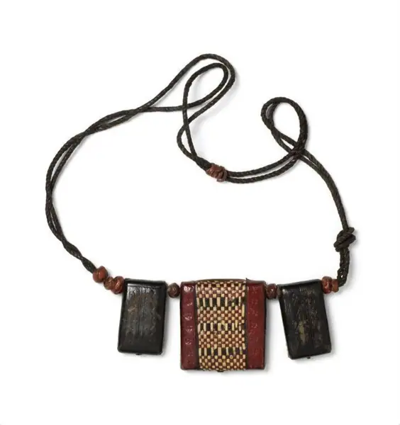 Three leather amulets on strap, to be worn around the neck, West Africa (possibly Nigeria), before 1966