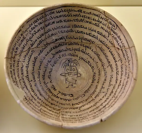 Incantation bowl, from Babylon, Iraq. Aramaic inscription with a human figure. 4th to 7th century CE. Pergamon Museum