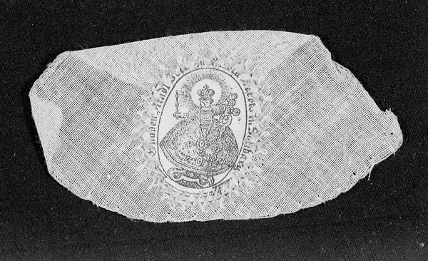 Fraisenhendchen or Lorettohemdchen; amulet. Image printed on silk and attached to a piece of gauze with cross-stitch.