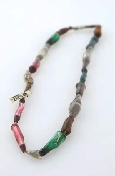 An amuletic necklace worn to cure sore throats, London.