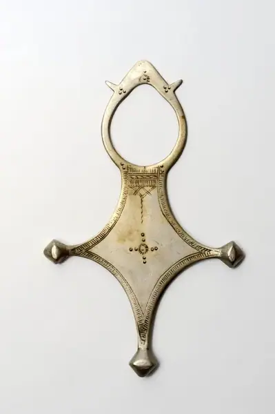 Zilveren kruis, dient als talisman