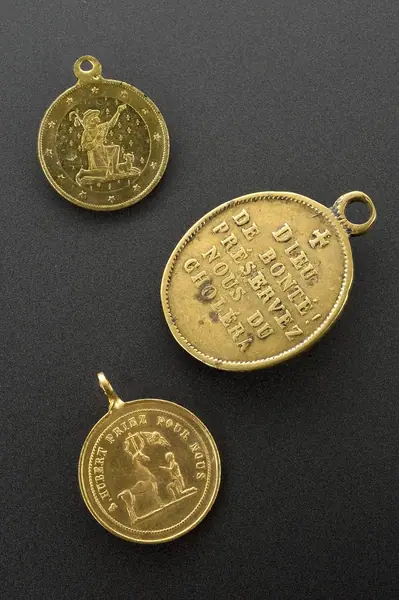Top to bottom: A678713, Brass medallion involving the protec