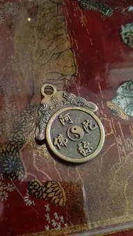 Amitābha-Buddha charm, Delft (2018)