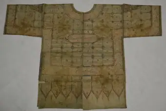 Textile, talismanic shirt, inscribed and painted cotton, with ink and gold paint, probably India, ca