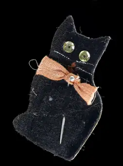 Paper amulet in the shape of a black cat, England, 1914-1918
