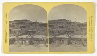Indian Pueblo of Zuni, New Mexico; view from the interior. The "Pueblo" or town, encloses a quadrangular area within which are the ruins of a church built under the direction of the Jesuit missionaries. The houses are built one above the other to the height of five or six stories. The entrances are mostly from the top, the ascent and descent being made by ladders, No. 16 from the series "Geographi
